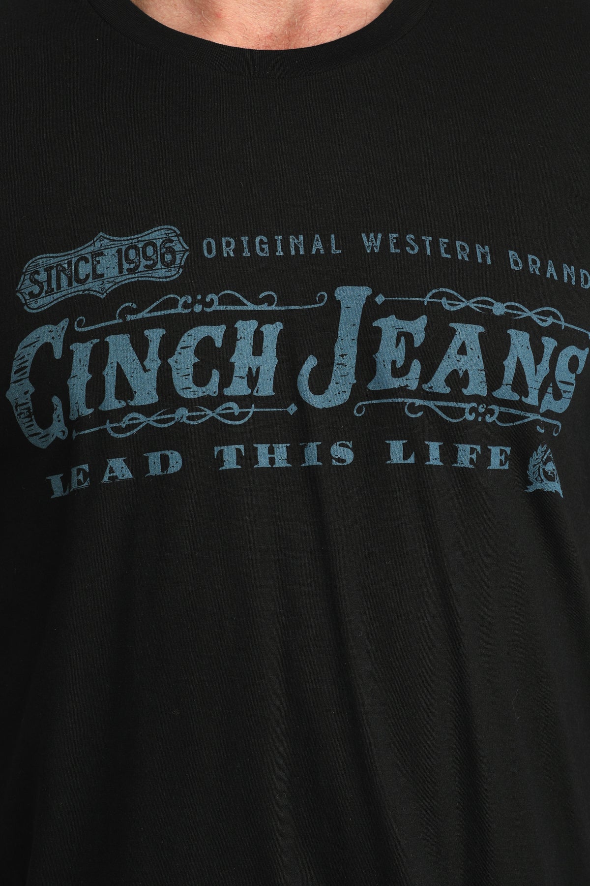 Black t-shirt with 'Cinch Jeans' text and branding on a plain background