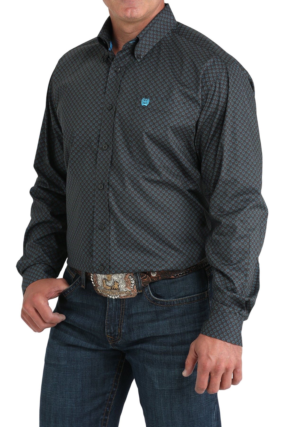 Man wearing a patterned black long sleeve button-down shirt and jeans on a transparent background 