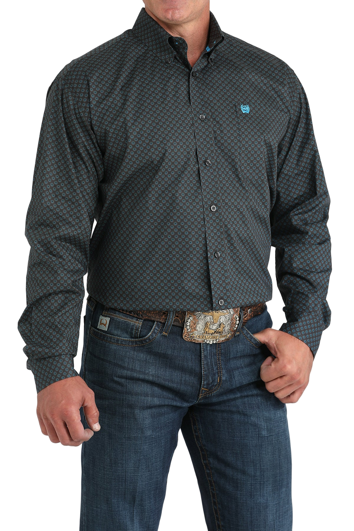 Man wearing a patterned black long sleeve button-down shirt and jeans on a transparent background 
