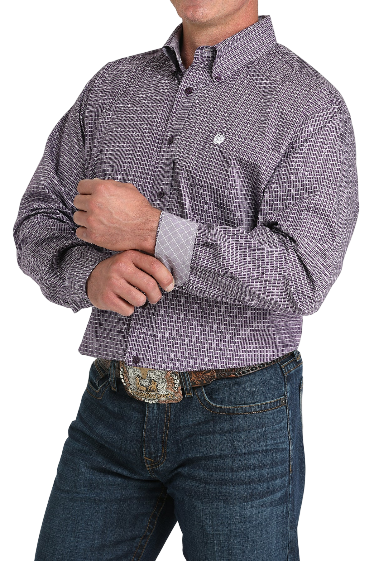 Man wearing a patterned purple long sleeve button-down shirt with contrasting cuffs and jeans on a transparent background 