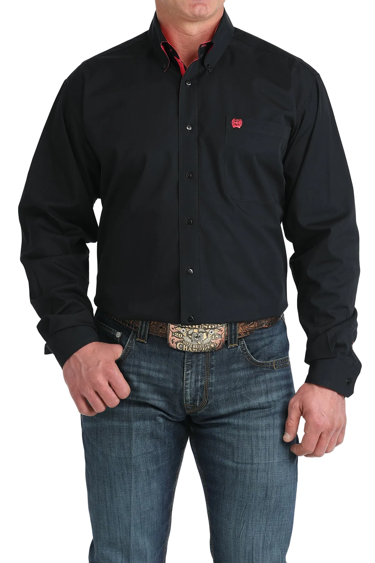Person wearing a black shirt with a red logo and blue jeans on a white background
