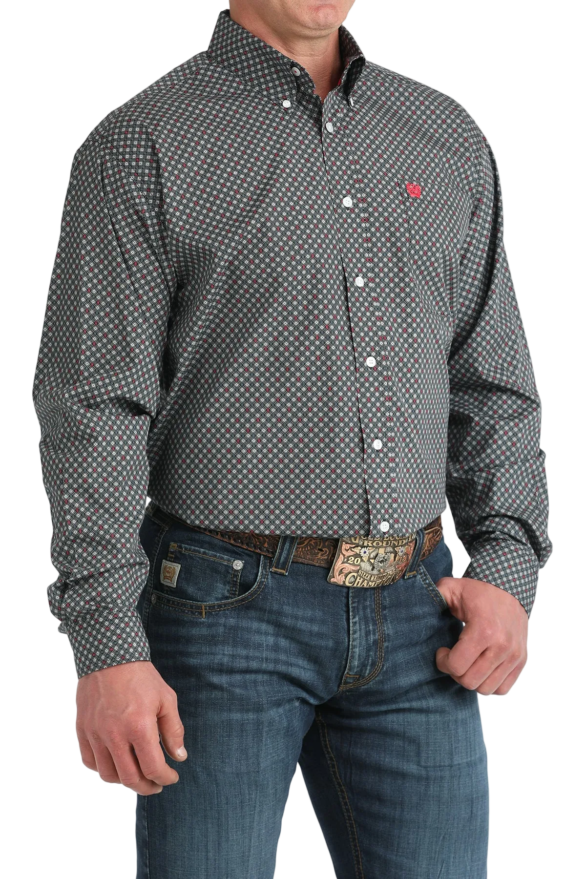 Man wearing a patterned button-up shirt and jeans on a white background