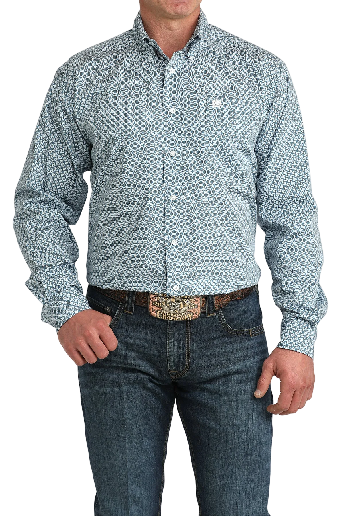 Man wearing a patterned button-up shirt and jeans on a white background