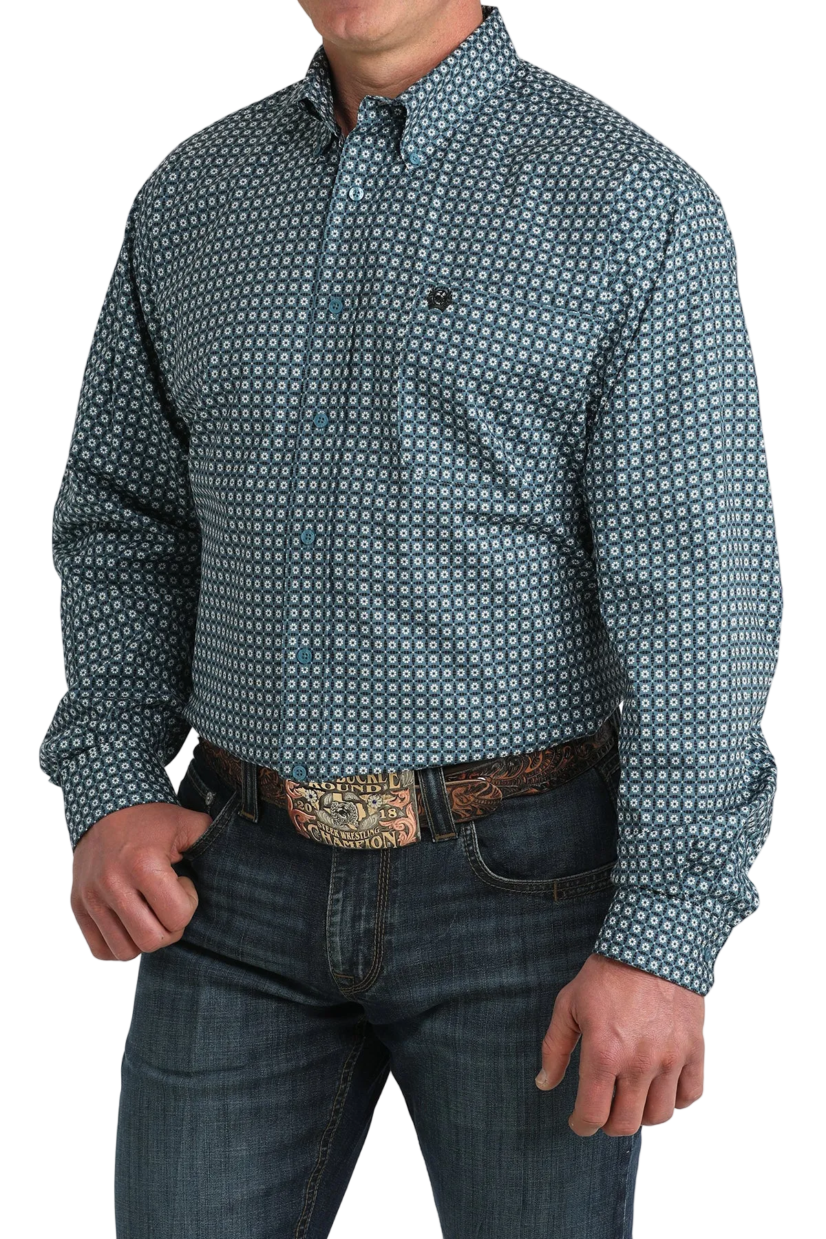 Man wearing a patterned blue shirt and jeans on a white background