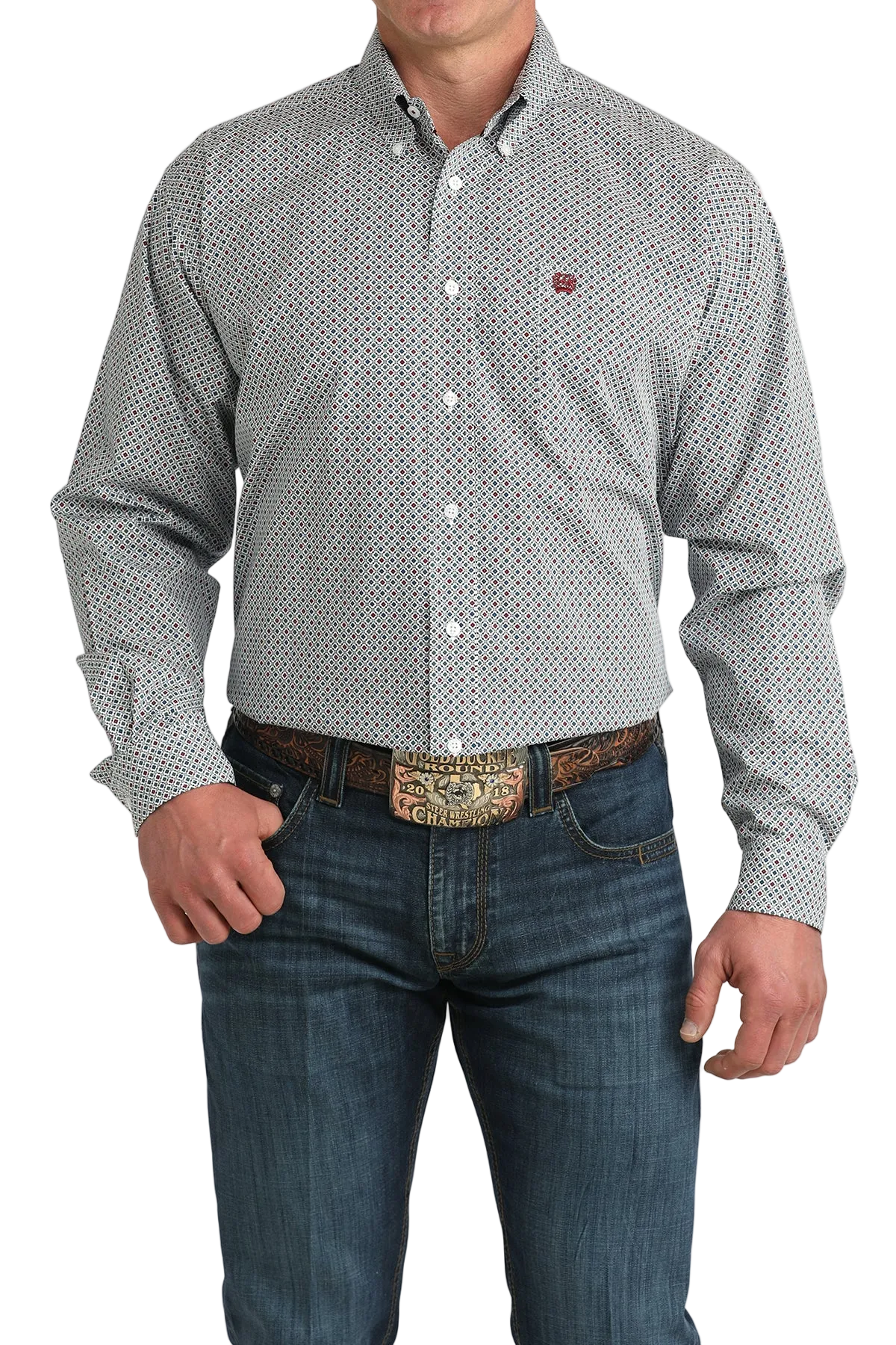Man wearing a patterned shirt and jeans with a belt on a white background