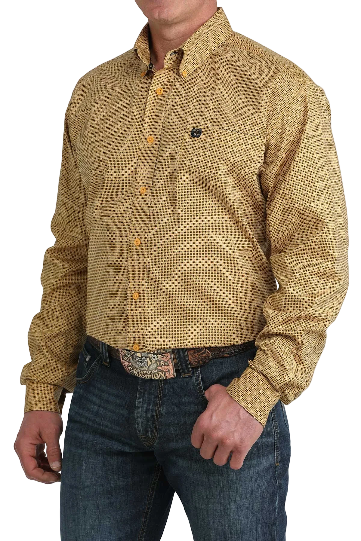 Man wearing a patterned yellow shirt and jeans on a white background