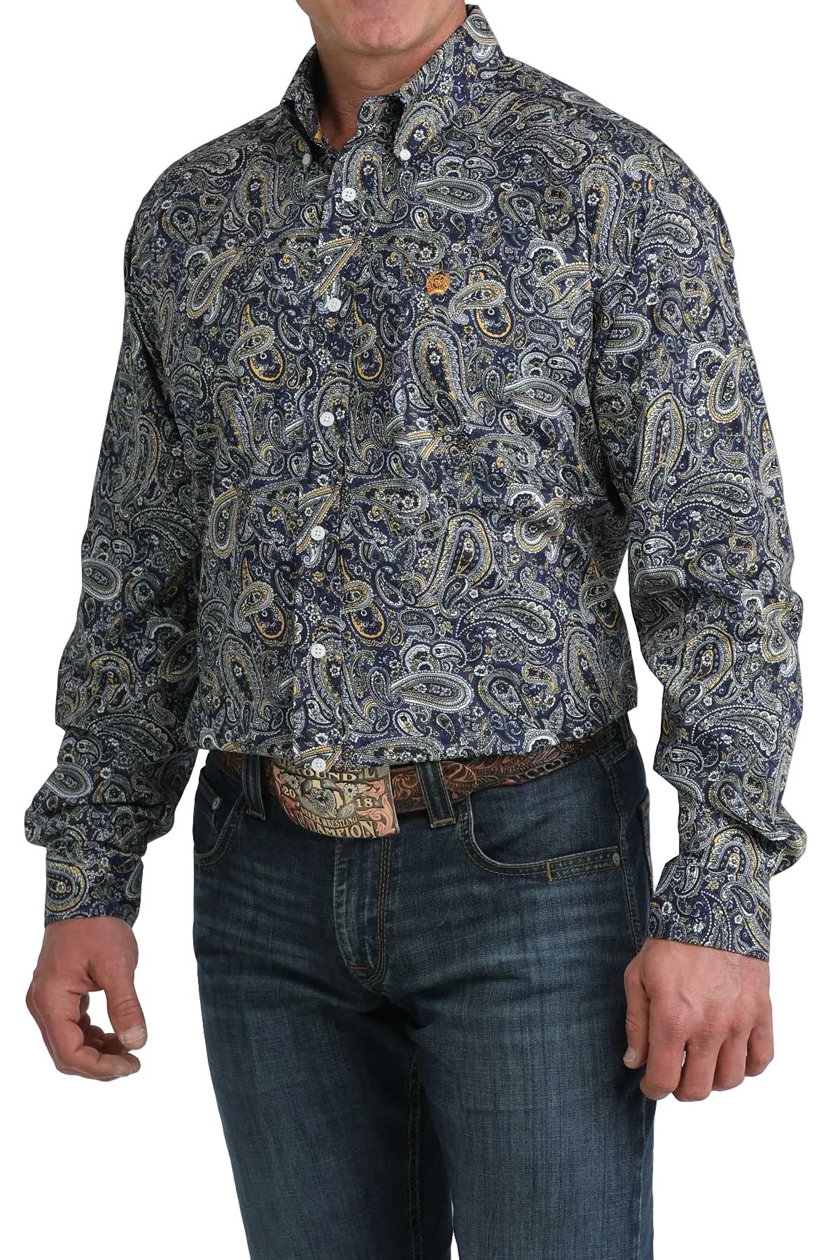Man wearing a patterned shirt and jeans on a white background
