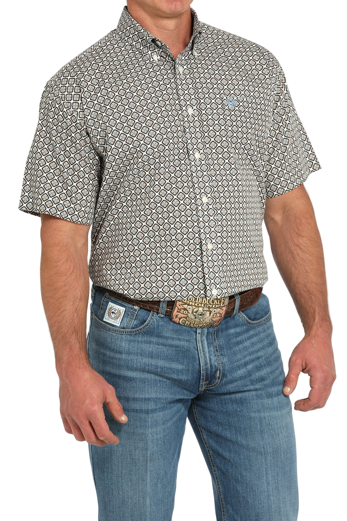 Man wearing a patterned short sleeve button-up and jeans on a transparent background