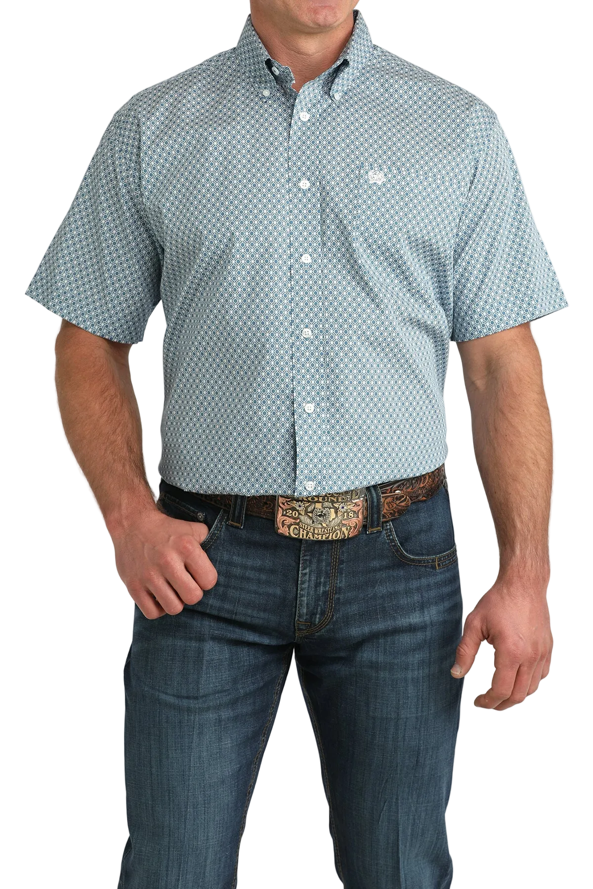 Man wearing a short-sleeve button-up shirt with a subtle pattern and jeans on a white background