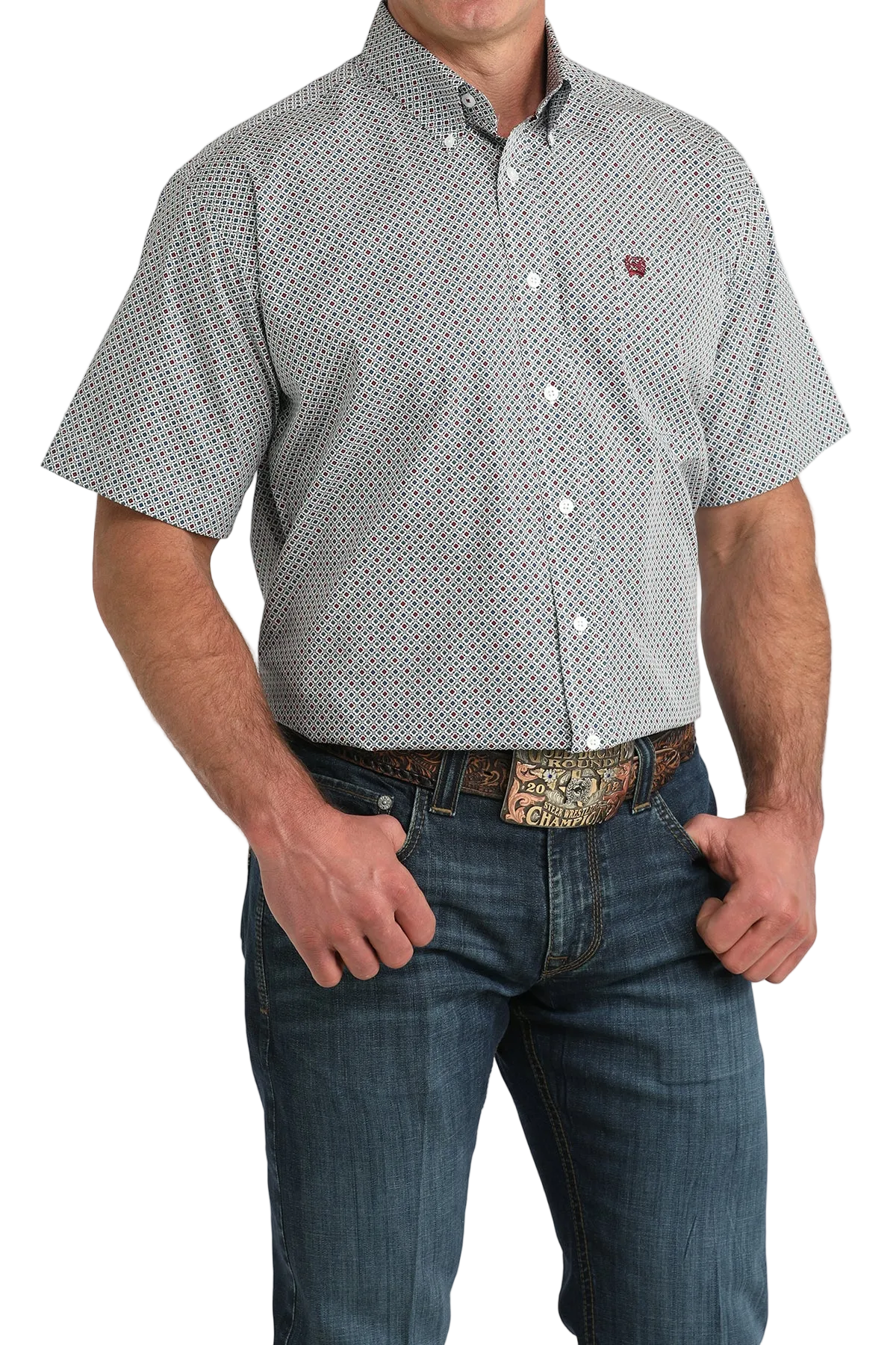 Man wearing a patterned short-sleeve shirt and jeans on a white background
