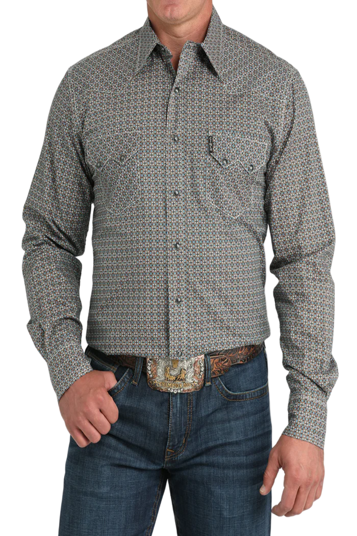 Man wearing a patterned gray shirt and jeans on a white background