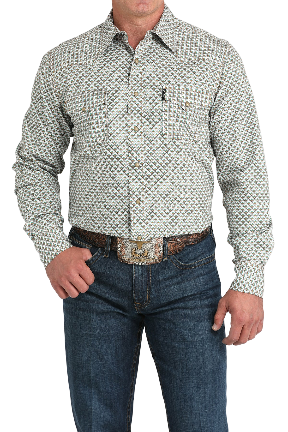 Man wearing a light gray patterned button-up shirt with blue jeans on a white background