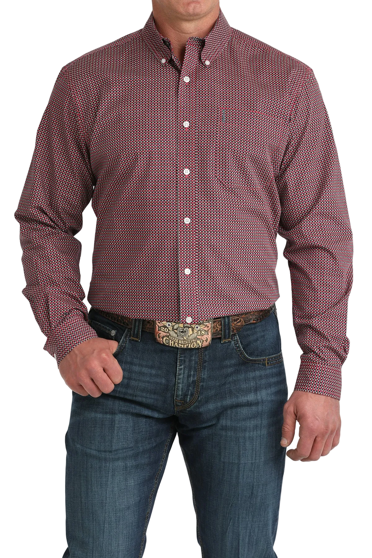 Man wearing a patterned red shirt and blue jeans with a white background