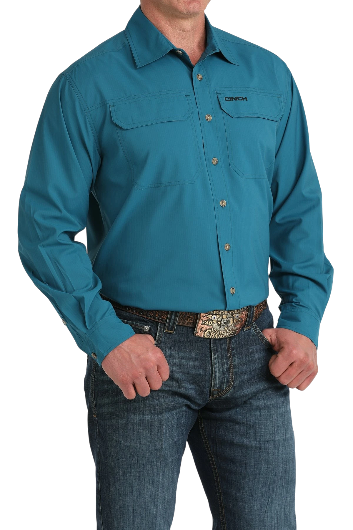 Go West Supply Cinch men's teal long sleeve Arenaflex shirt with two chest pockets and embroidered logo. Poly-spandex blend.