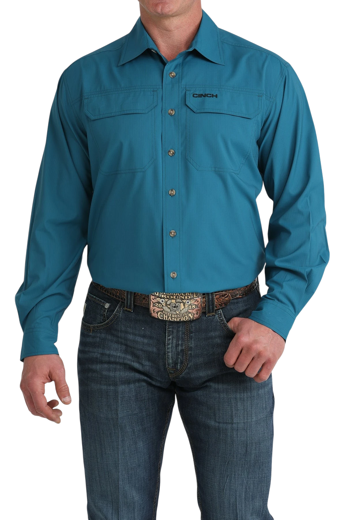 Go West Supply Men's teal long sleeve Arenaflex shirt with embroidered Cinch logo and two chest pockets. Made from poly-spandex.