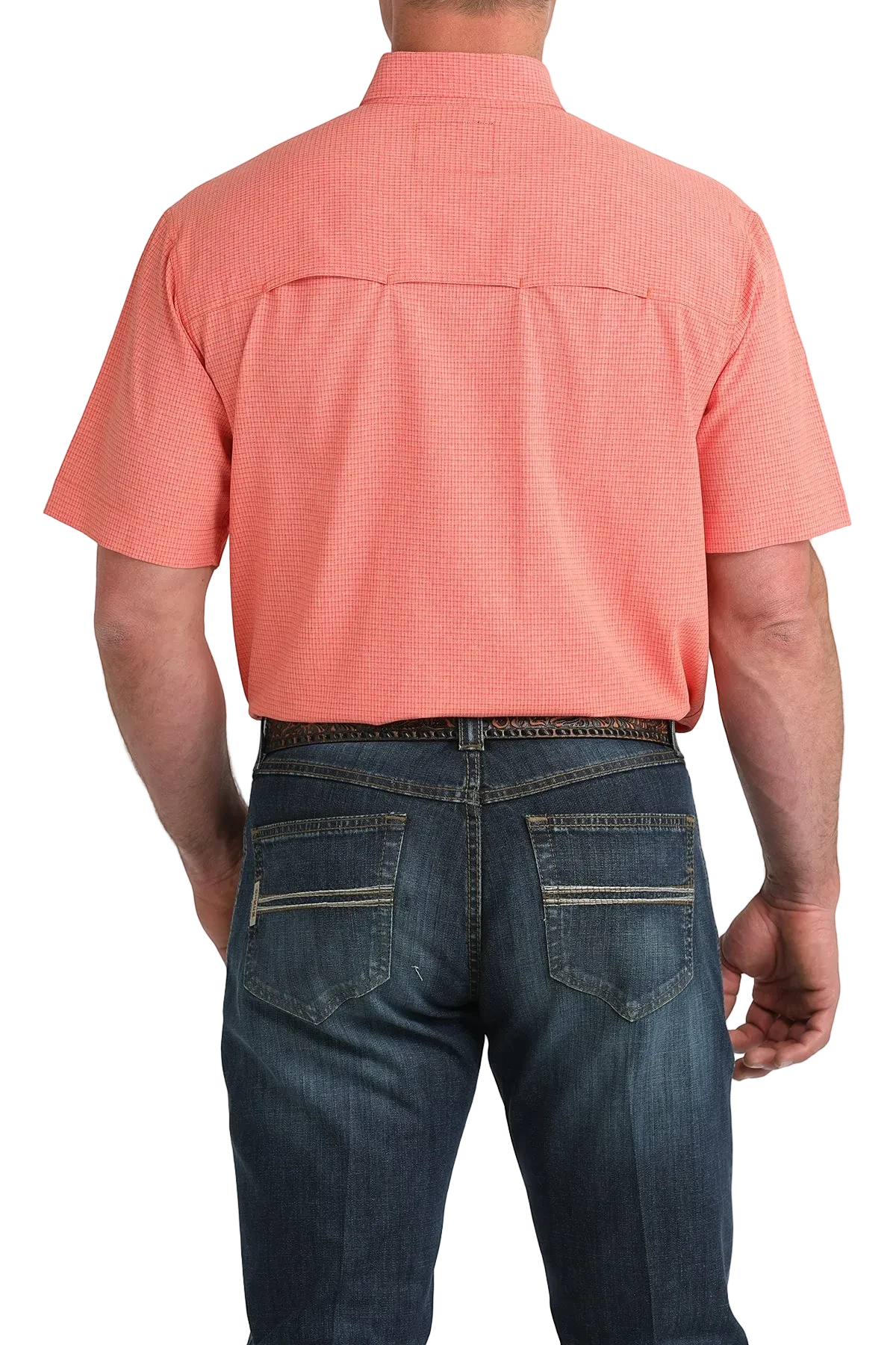 Person wearing a pink short-sleeve shirt and blue jeans on a white background
