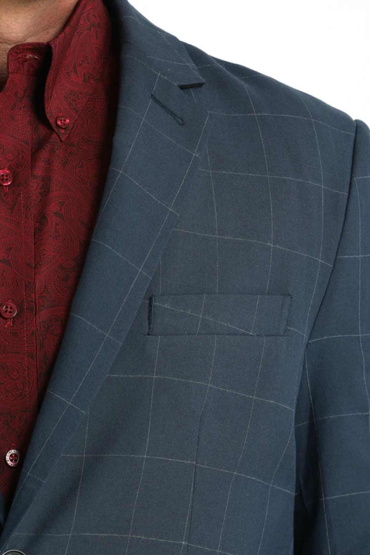 Blue checkered suit jacket with a red shirt underneath on a white background
