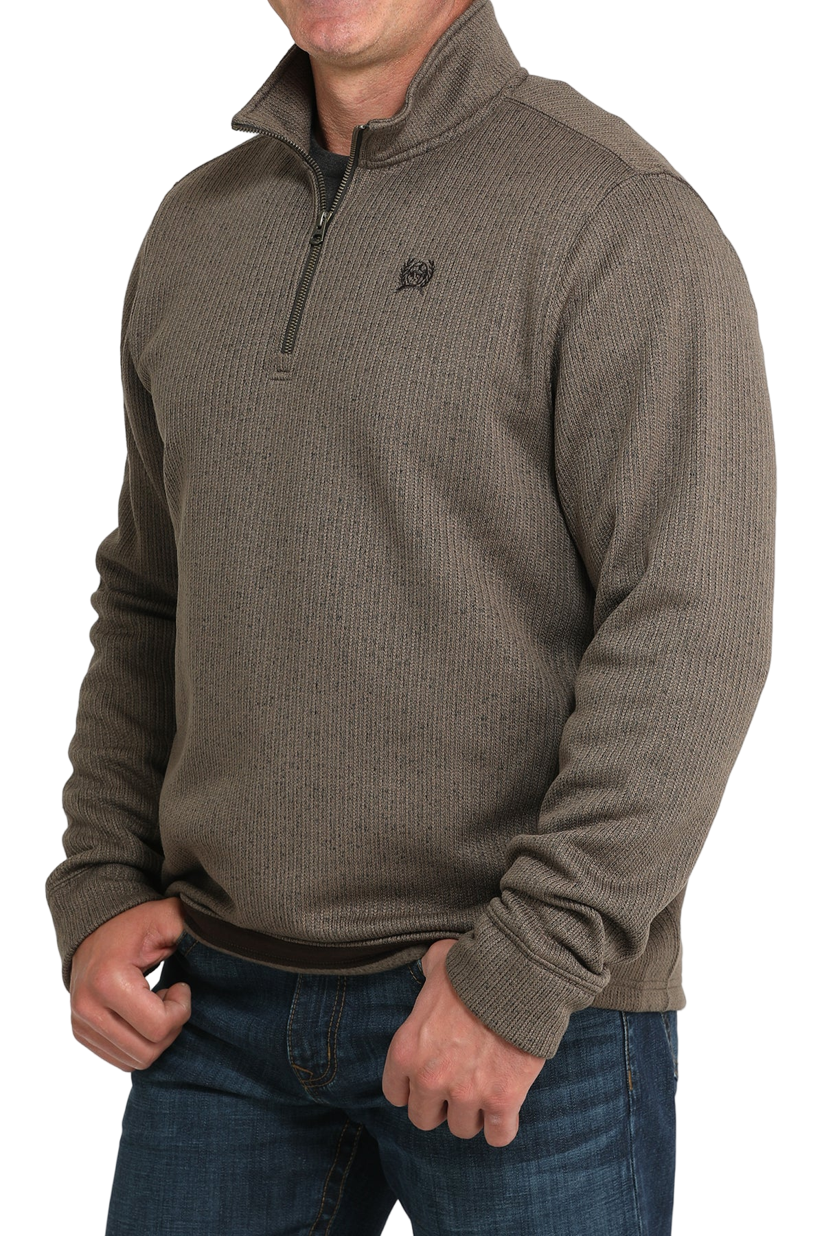 Man wearing a brown textured pullover with a quarter-zip design on a white background