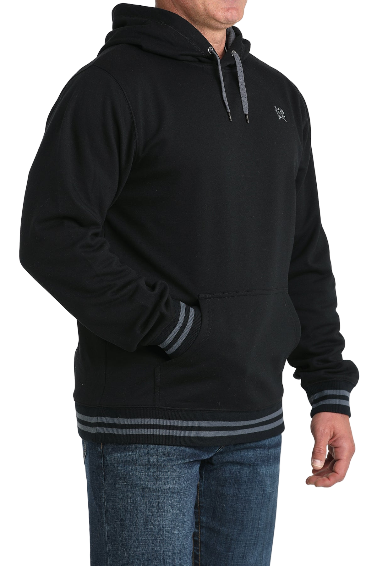 Man wearing a black hoodie with a small 'Cinch' logo on the chest, paired with jeans on a transparent background