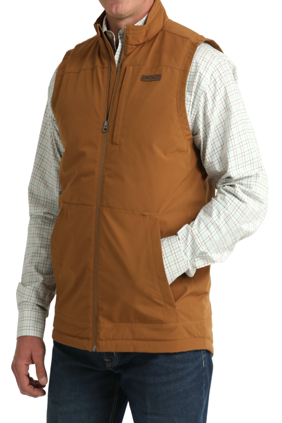 Brown vest worn over a plaid shirt on a white background