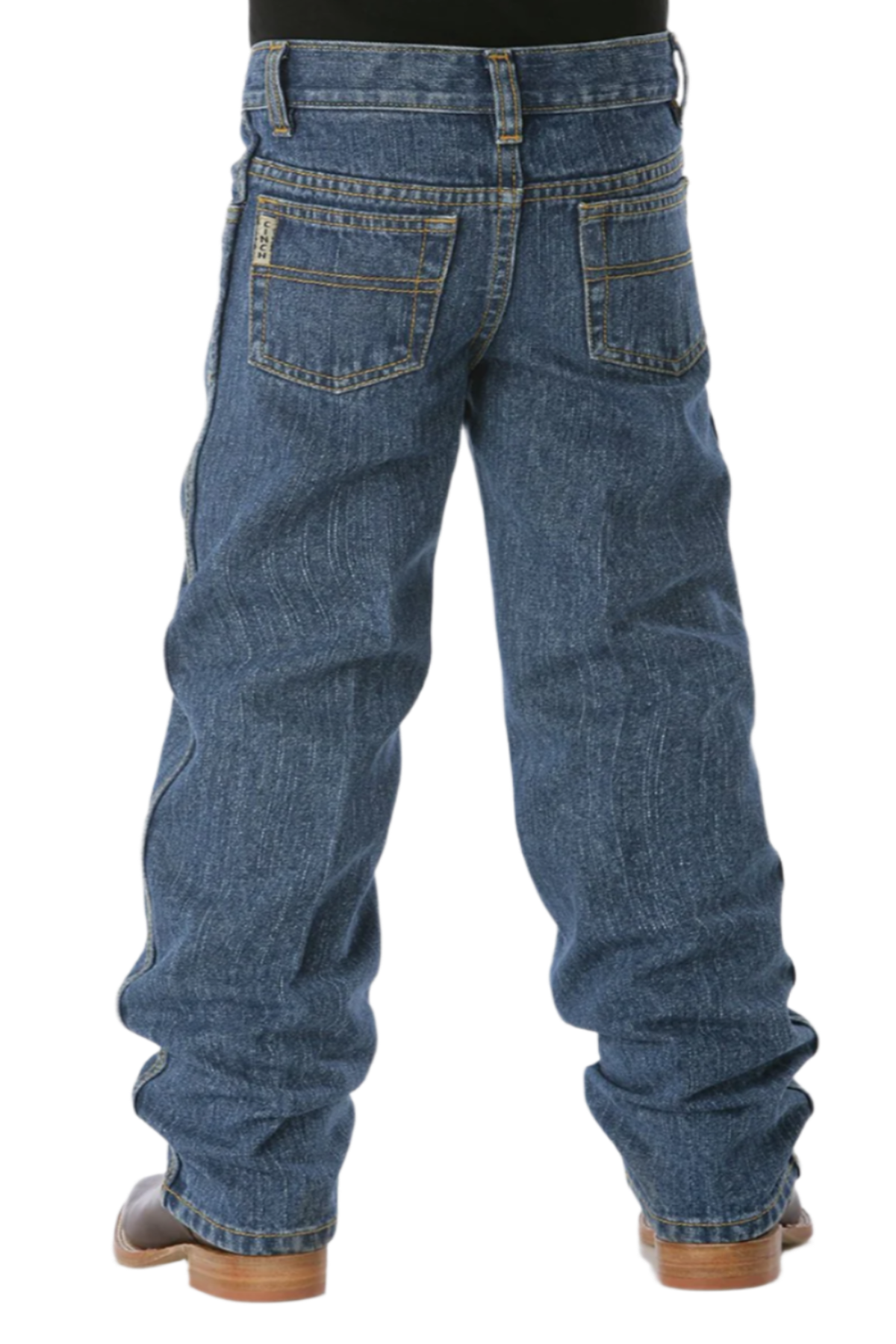 Child wearing medium wash Cinch jeans with boots