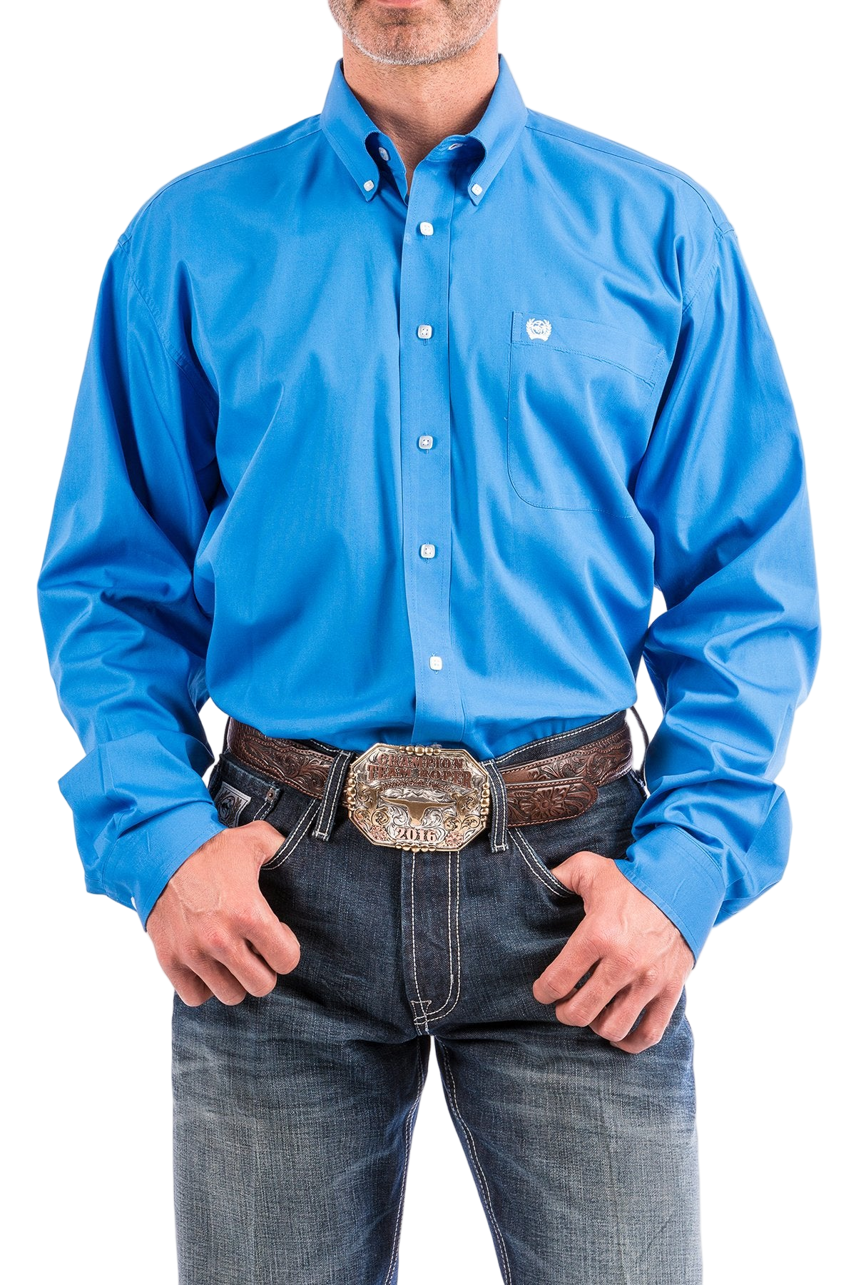 Man wearing a bright blue button-up shirt with blue jeans on a white background