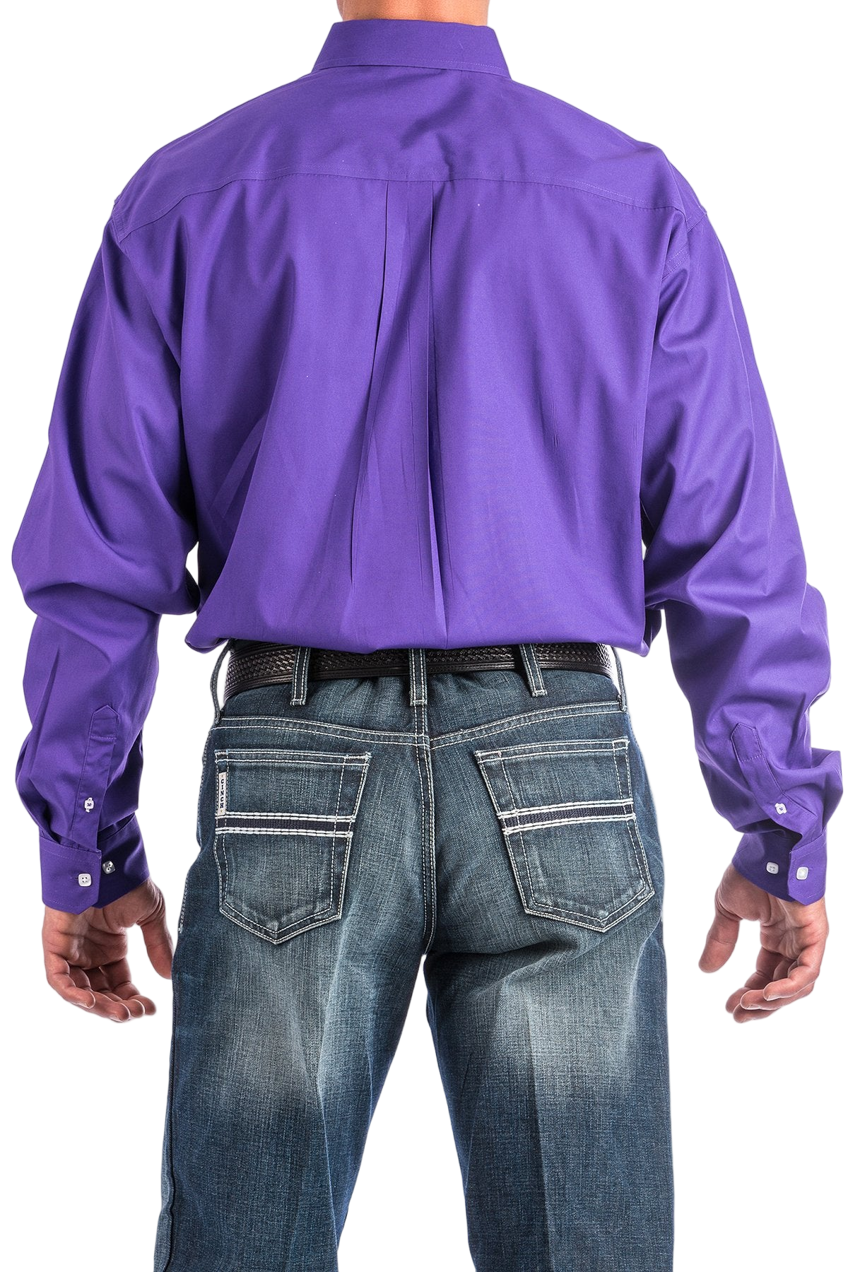 Back view of a man wearing a purple button-up shirt with blue jeans on a white background