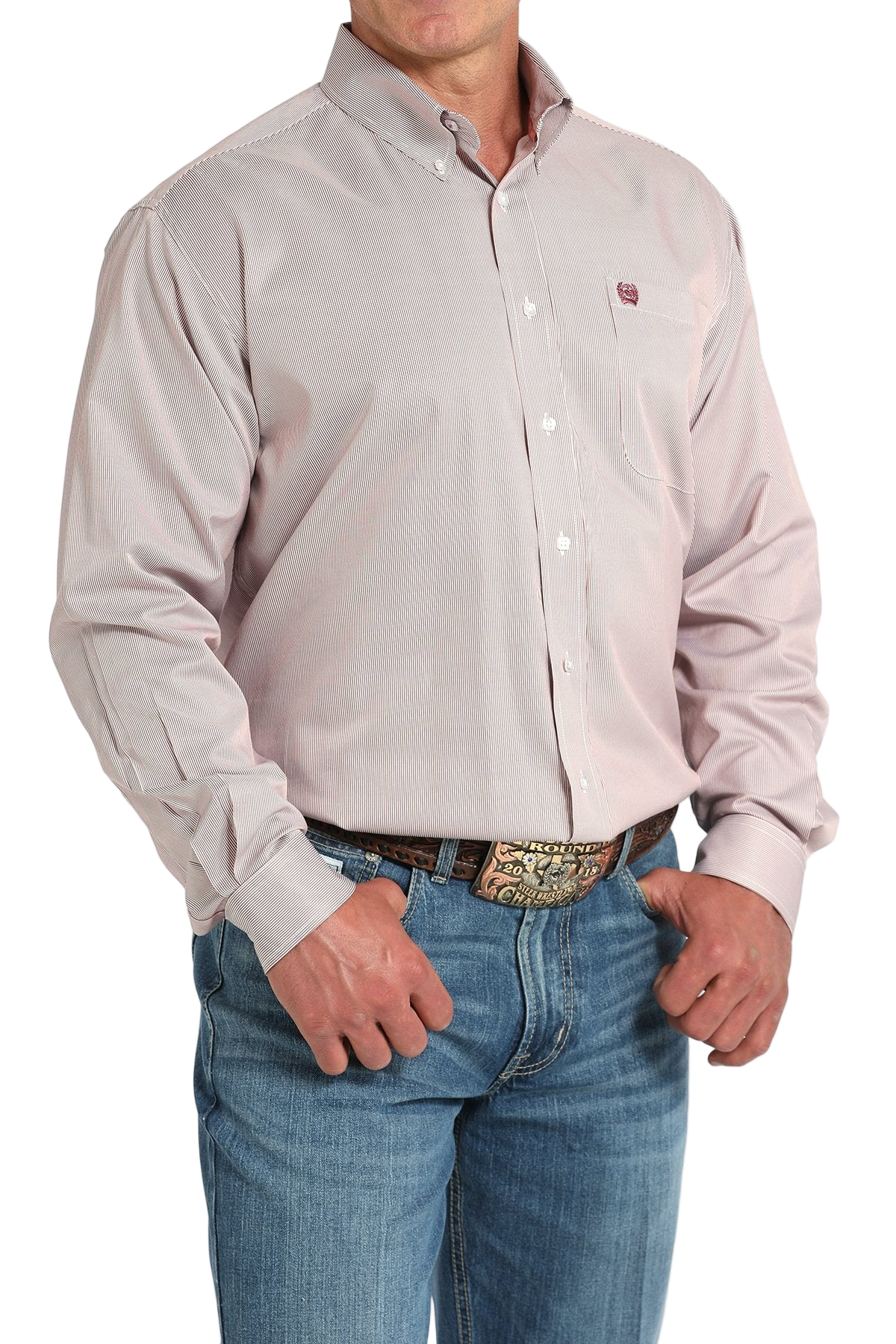 Man wearing a light gray button-up shirt and blue jeans on a white background